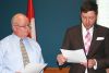 South Frontenac CAO Wayne Orr (l) administers the oath of office to new councilor Brad Barbeau, who was named to replace the late Bill Robinson. Photo/Craig Bakay