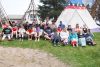 NAEC students and staff with hosts Tammy and Bernard Nelson and fire keeper Burk Donio. Photo by Xavier Gomez