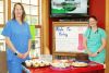 Dawna Revell and Kim Doucet at the bake sale table as Sydenham Veterinary Services had last week as part of their Ride For Farley campaign.