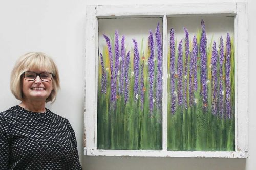 Joanne (Bertrim) with her favourite piece in the show, Fields of Lavender. Photo/Craig Bakay