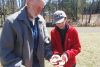 Don Cuddy and son Andre study a salamander that had been making his way across the field towards the water at Plevna picnic area. Yes, he completed the journey.