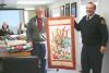 Coun. Gerry Martin and Fire Chief Eric Korhonen show off one of the quilts the Verona Trinity Quilters have donated to North Frontenac Emergency Services.