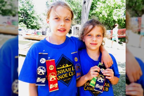 Kiera and Charlotte Wilson with badges galore