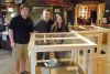 Cloyne Pioneer Museum and Archives staff l-r Nick Boomhower, Mike Deshane and Emma Benn at the Museum&#039;s new WW1 display