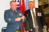 Legion vice president Jeff Donelly (right) presents Warrant Officer Joe Kiah with a gift at the annual Veterans Dinner at the Sharbot Lake Legion