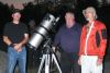 Don Vaillancourt of the North Frontenac Economic Development committee and Alex Dolnycky and Frank Dempsey of the North York Astronomical Association get ready for Saturn to make an appearance at last Saturday’s star party on the pad near Plevna. Photo/Craig Bakay