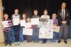 Arden Legion branch president Peter DesRoche with seven of the eight students at LOLPS who were presented with second place awards and honourable mentions in this year’s Legion Zone G1 essay and poster contests.