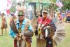 Head veteran Sharp Dopler and James prepare for a warrior dance at the Silver Lake Pow Wow