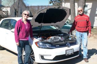 Marion Watkins (L) and David Hahn (R) showing off the inner workings of their E-Golf