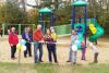 Ribbon-cutting for play structure: SF Mayor Ron Vandewal, Amanda Pantrey and Kyle Gordon. Amanda and Kyle were behind the planning and fundraising for the structures (the large one pictured, a set of four swings, and two separate pieces for smaller children.) Colours are in recognition of the two big lakes, Dog and Loughborough, which have been and are an important part of Battersea. SF Township contributed $15,000, and within 8 months, almost double that amount was raised by the community.