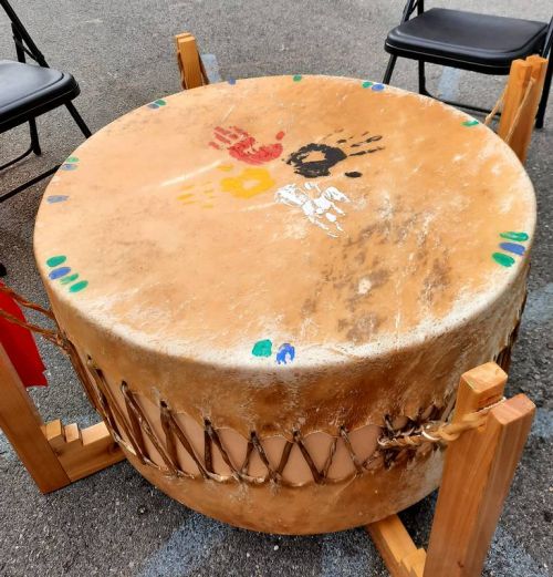 The new grandmother drum at GREC. The Yellow hand-print represents children, the yellow learning, the black the responsibility to make those teachings available, and the white the knowledge of the elders.