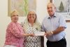 Frances Smith, Mayor of Central Frontenac presents Pine Meadow Nursing a cheque for $12,500 towards the window project