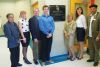 George Beavis, Suzanne Ruttan, Jeff Sanderson, Connor Bayers, Brenda Hunter, Laurie French and David Jackson pose at the new plaque dedicating Sydenham High School&#039;s new 14,000 square foot Wellness Wing