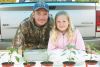 Fynn Collins along with some support from dad Mike is selling the seedlings she’s grown at the Frontenac Farmers Market in Verona this summer