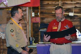 Harold Dalmas (L) receives the Silver Acorn Award from Jim Peverley, Voyageur Council Commissioner.