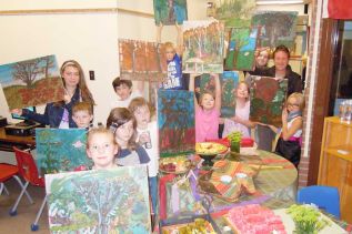 Students in the Land O' lakes Art Club show off their landscape paintings at a special art show/vernissage that took place at Land O' Lakes Public School in Mountain Grove on November 19. 