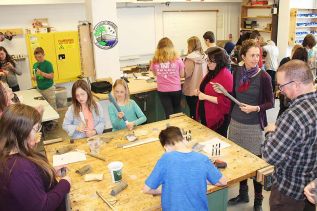 The flute-making workshop was a hive of activity, under the watchful eyes of teacher Julia Schall and consultant Jeff Petznick.