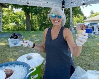 Theresa Kenney from Trousdale's General Store served up ice cream at the Lakes & Trails festival.