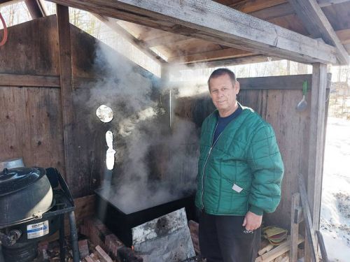 Mike Procter boils down maple sap.