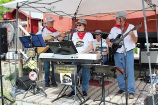 Sunshine Soul (Don Watson, Paul Goudreau, Ken Furnell and Linda Silver) served up a set of train songs at the Kick & Push Railroad’s 2019 season opening Saturday at Railroad Park in Sharbot Lake. Photo/Craig Bakay