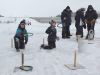 World premier event — Brooks and Mae Quail become the first-ever participants in Beaver Gnaw Toss, a horseshoe-like game using targets made from sticks gnawed by beavers and garden hose rings from the mercurial mind of Gord Brown. Photo/Craig Bakay