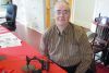 Eric Simkins, of Simkins Sewing Machines with the 1867 Abbott machine that his grandfather M.W. Simkins sold in 1867.