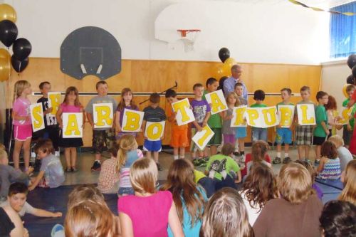 SLPS's grade 1 & 2 students present a school acrostic.