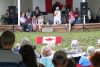 Pam Giroux reads the story of Noah’s Ark to some of the younger ones in attendance at the Sharbot Lake Ecumenical Service last Sunday at Oso Beach.