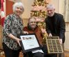 Neil Allan, (middle) chair of the Frontenac Accessibility Advisory Committee, presenting the 2019 Accessibility Award to Susan Ward-Moser, chair of the board for Southern Frontenac Community Services, while Warden Ron Higgins (left) holds up the plaque listing all of the previous award winnners, at the Frontenac County Warden&#039;s reception which was held at the Grace Centre last Thursday (December 12) 