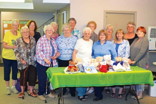 members of the Harrowsmith Women's Institute with some of the results of their own Teddy Bear and Quincy Project.