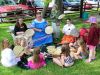 Kids of all ages joined in the drumming circle last Friday as Shabot Obaadjiwan First Nation and EarlyON welcomed visitors to Oso Beach. Photo/Craig Bakay