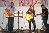 Abby Stewart rocked Prince Charles Public School last week for Pink Shirt Day with help from Shaun Weima (guitar) and Lee Casement (bass). Photo/Craig Bakay