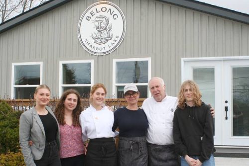 The Long family is ready to welcome customers to their restaurant.