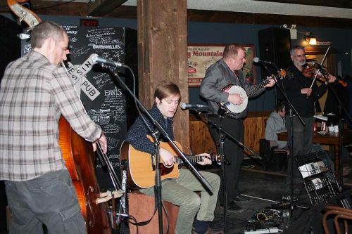 Turpin’s Trail (Noah St. Amand, Jon McLurg, Chris Murphy and Brian Flynn) provided the music component of the Newfoundland Kitchen Party at The Crossing Pub in Sharbot Lake last Saturday. Photo/Craig Bakay
