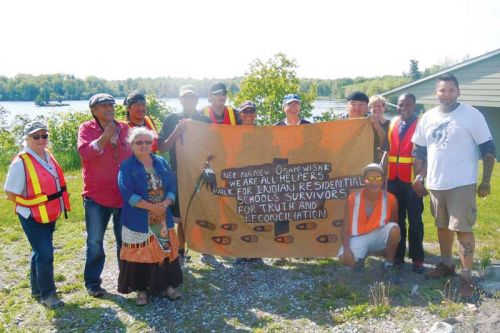 he Muskegowuk walkers from the Moose Cree First Nation stopped in Sharbot Lake and were joined by members of the local Anglican church community and Shabot Obaadjiwan First Nation on their way to Ottawa with the aim of raising awareness and promoting education about Canada's Indian residential schools