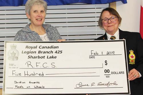 Sharbot Lake Legion President June Crawford presents a $500 cheque to Catherine Tysick, Rural Frontenac Community Services adult centre manager for Meals on Wheels.