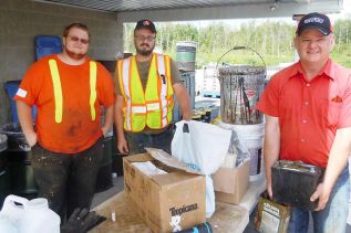  Joe Desjardins and staff from Drain All Ltd. at the South Frontenac Hazardous Waste Site, which is open weekly at 2491 Keeley Road