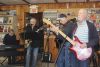 From left: Andrew Wernick (keys), Peter Hooiveld (guitar), Dale O’Hara (guitar) and John Fradenburgh (bass) jamming out at Spill The Beans last Friday in Northbrook. Photo/Craig Bakay