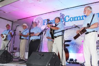 Bill White & White Pines performing at the Flinton Community Jamboree Saturday evening. Mike Doggett (banjo), Roland Barlow (mandolin), Joe White (fiddle), Tom Gardiner (bass), Bill White (guitar), Barry Calthorpe (dobro). Photo/Craig Bakay
