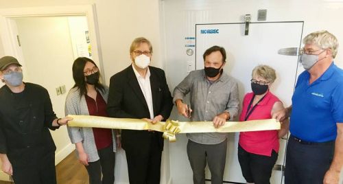 L>R: Cook; CFKA assistant; Rob Wood, chair of CFKA; Andrew Davies; Ellen Mortfield, Food Bank and Family Services Coordinator; David Townsend, Executive Director, SFCS