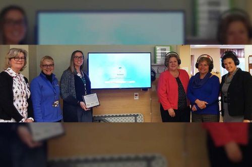 Left to right: Kathy Burke, Board President, H’art Centre; Lindsey Foster, Rotary Club of Kingston; Chelsea Cawker, Assistant Director of Care (Resident Services), Fairmount Home; Julie Tompkins, Empire Life; Jan Dines; Michelle Clarabut, Go Wireless Project Coordinator