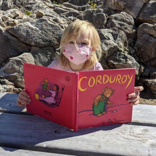 Neveah, a primary student at Granite Ridge Education Centre enjoys a good book.