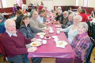 Diners enjoy a pancake brunch at the Maberly Agricultural Society's annual fundraiser at the Maberly hall on April 18