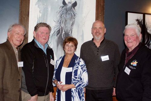 (L to R) Ken Fisher, Kelly Pender, Alison Robinson, Greg Rodgers, Bill Bowick, at the Crossings Pub in front of a painting by Jen White