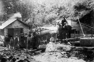 The Tett Mine operation, down in the ravine circa 1905.