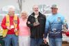 From left: Lions Paul Riddell (tournament chair), Helen Burke, Catch of the Day winner Martin Collicott and his pro guide Scott Campbell. Photo/Craig Bakay