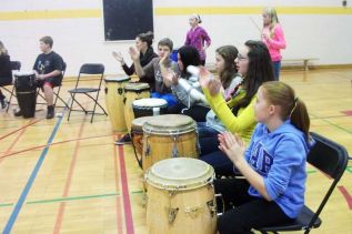 Elementary and secondary students enjoy the drumming workshop