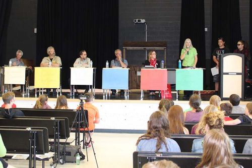The candidates debate at GREC, from left: Independent John McEwen, Libertarian Steve Gebhardt, New Democrat Ramsey Hart, PC Randy Hillier, Liberal Amanda Pulker-Mok, Green Party Anita Payne and moderators Tyee Davis and Carrie-Lyn Shields. Photo/Craig Bakay