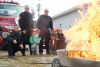 L-r Landen and Liam of Snow Road learn to PASS with members of the Snow Road fire hall