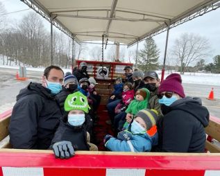 Families enjoyed the wagon ride provided by Whites's Rides of Westbrook during the South Frontenac Family Day celebration at Frontenac Community Arena.